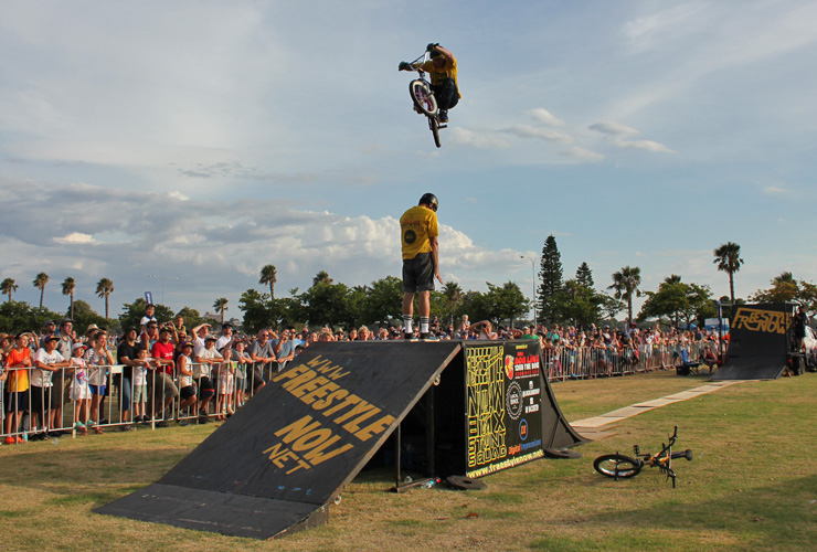 Freestyle Now bmx stunt show - Australia day 2016 Dylan Schmidt jumps over Shaun Jarvis